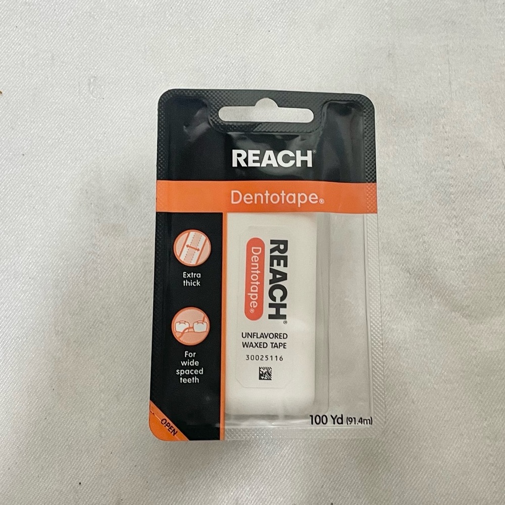 NEW Reach dentotape unflavored waxed tape 100 yd